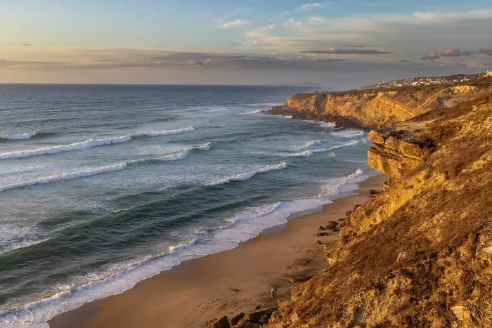 Framed Print : Cliffs over beach at Colares, Portugal