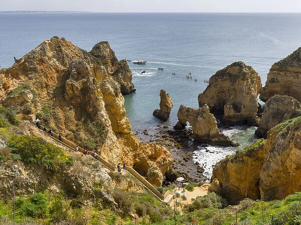 The cliffs and sea stacks of Ponta da Piedade at the rocky coast of the Algarve in Portugal
