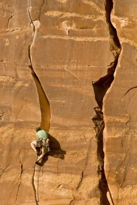 Framed Print : Climbing guide, Moab Desert Adventures in the crux of Miss Kitty likes it that way