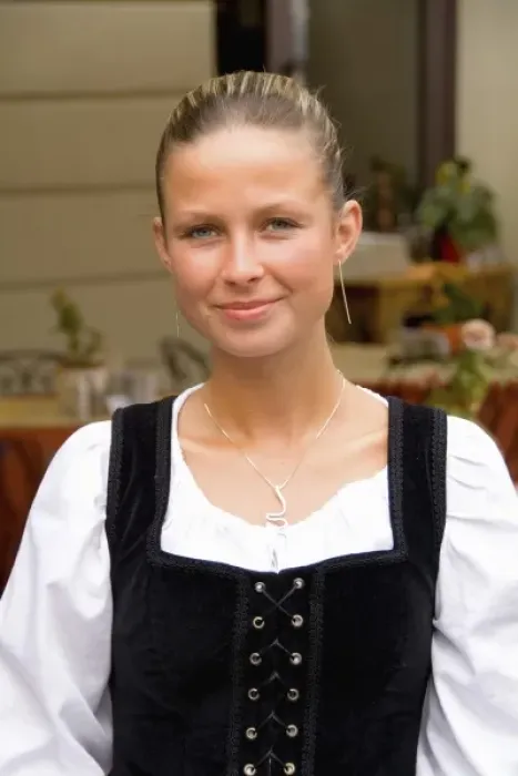 Framed Print : Close up of beautiful waitress in costume of tourist city of Cesky Krumlov in Czech Republic