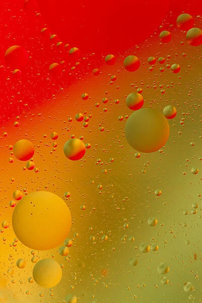 Close-up pattern of bubbles in oil and water mixture