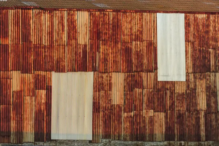 Framed Print : Close-up of rusted corrugated metal panels