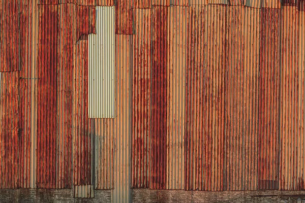 Close-up of rusted corrugated metal panels