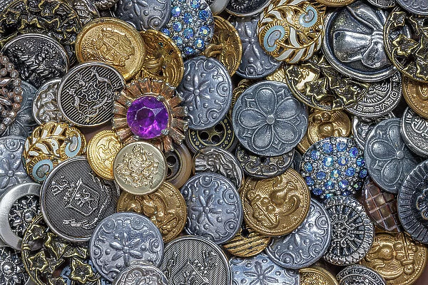Close-up of variety of metal buttons