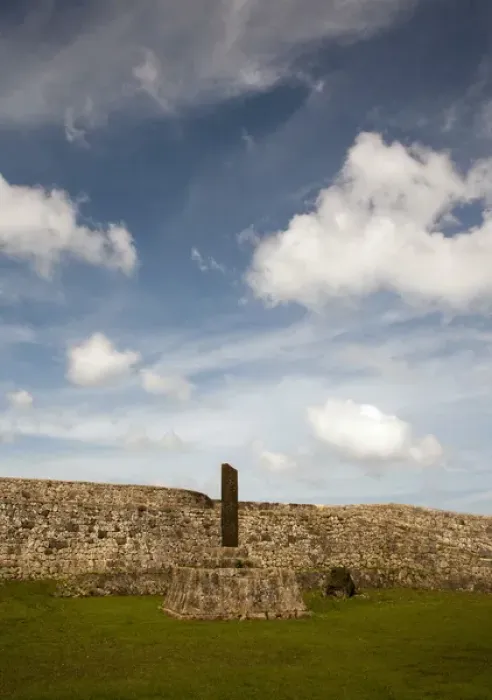 Framed Print : Clouds drift over the stone walled fortifications of Okinawa Japans historic Nakagusuku Castle