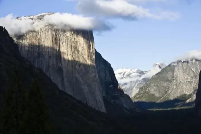 Framed Print : Clouds form around the peak of El Capitan as afternoon light paints Yosemite Valley Framed Print : Clouds form around the peak of El Capitan as afternoon light paints Yosemite Valley