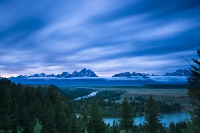 Framed Print : Clouds illuminate with red light above the Grand Teton mountains seen from the Snake