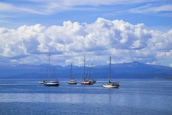 Clouds over sail boats in the ocean, Ushuaia, Argentina