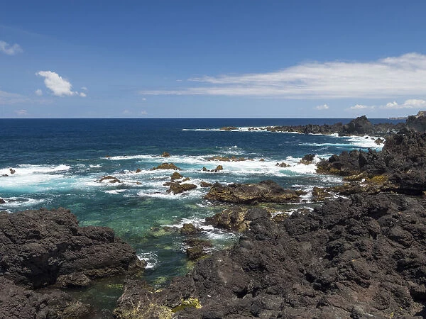Coast with lava flow and beach near Biscoitos. Terceira Island, Azores, Portugal
