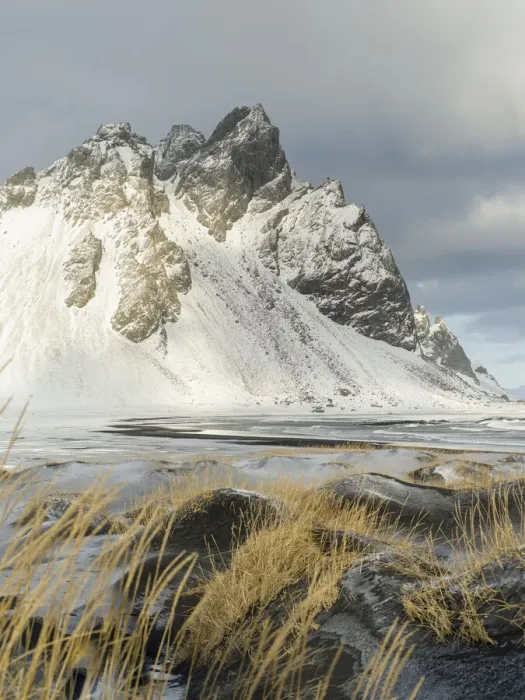 Framed Print : Coastal landscape with dunes at iconic Stokksnes during winter and stormy conditions