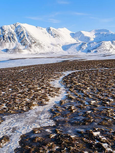 Coastal plain of Nordenskiold Coast. Landscape in Van Mijenfjorden National Park, (former Nordenskiold National Park), Island of Spitsbergen. Arctic region, Scandinavia, Norway, Svalbard