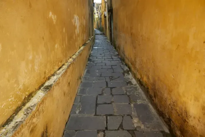 Framed Print : Cobblestones and yellow walls in alleyway, Hoi An (UNESCO World Heritage Site), Vietnam