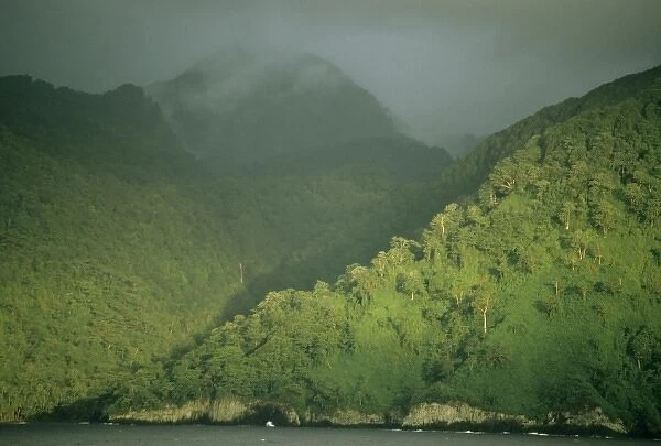 Cocos Island National Park, sunset on forest-lined cliffs, Costa Rica