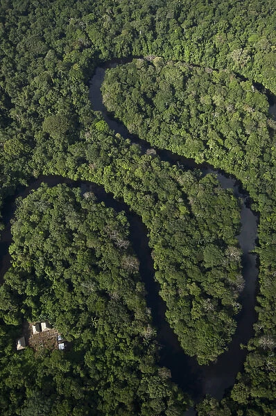 Cofan houses in Cuyabeno Reserve. Cuyabeno contains large tracts of permanently flooded forest