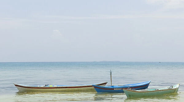 Colombia, San Bernardo Islands. Three small boats
