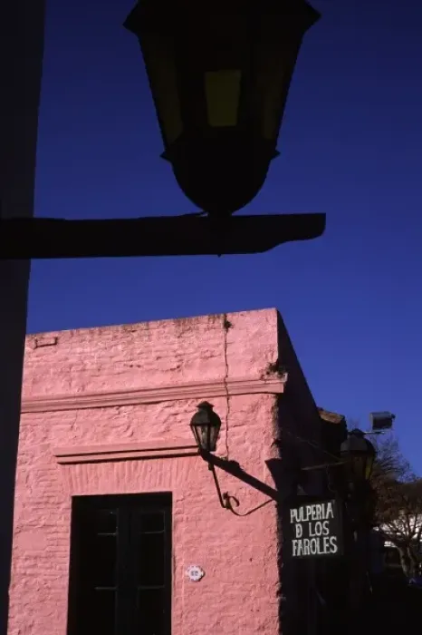 Framed Print : Colonia, Uruguay, Lamppost and colonial era building in Barrio Historico