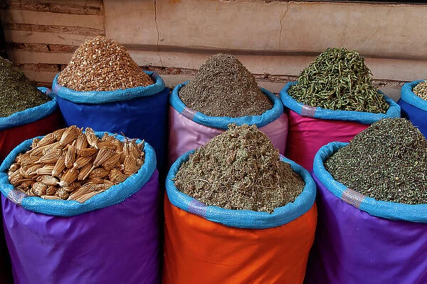 Colorful bags of spices for sale at the Medina Souk. Marrakech, Morocco