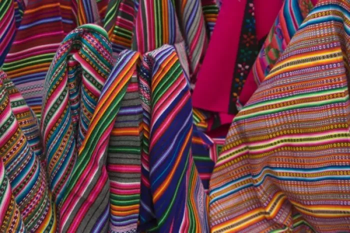 Framed Print : Colorful blankets on display at market, Huaraz, Peru