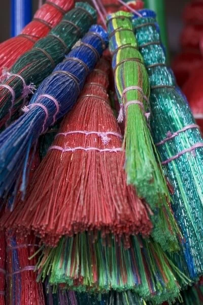 Colorful Brooms for sale by street vendor, Alexandria Egypt