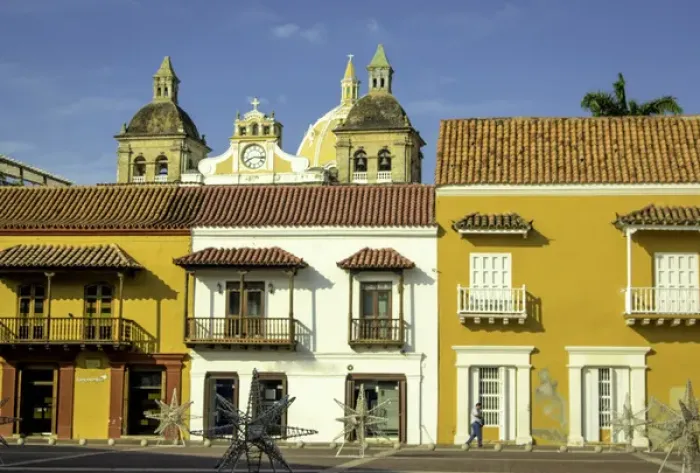 Framed Print : Colorful buildings and church domes in the Plaza de la Aduana, Old City, Cuidad Vieja