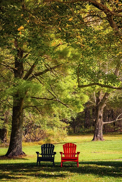 Colorful chairs on the banks of the lake, Peaks Of Otter, Blue Ridge Parkway, Smoky Mountains, USA