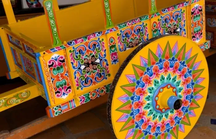 Framed Print : Colorful close up of famous wheel for carriages that are traditional in and around Framed Print : Colorful close up of famous wheel for carriages that are traditional in and around
