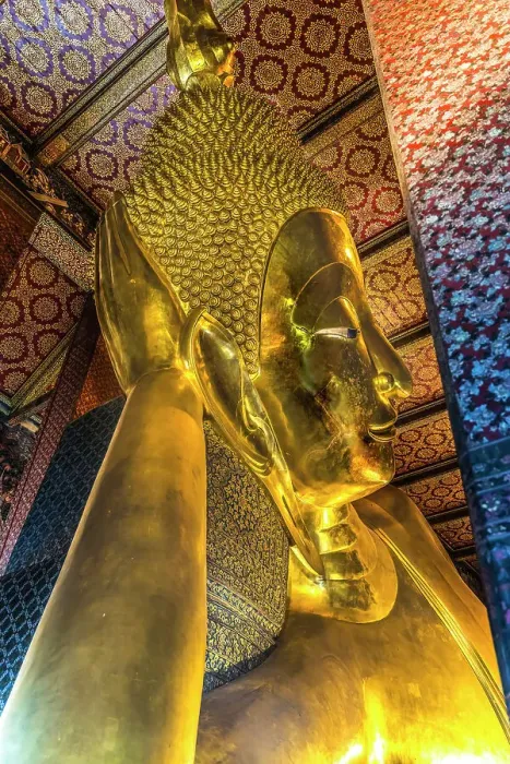 Framed Print : Colorful face Reclining Buddha, Wat Pho Temple, Bangkok, Thailand. Temple built in 1600's. Reclining Buddha built in 1832