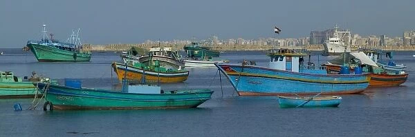 Colorful fishing boats in the Harbor of Alexandria Egypt and the Mediterranean Sea