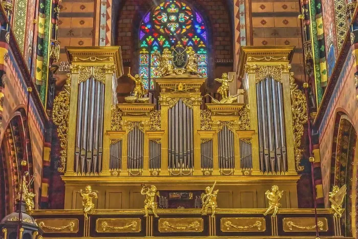 Framed Print : Colorful golden organ stained glass, St. Mary's Basilica, Krakow, Poland. Built first in 1300's and the interior in 1700's Framed Print : Colorful golden organ stained glass, St. Mary's Basilica, Krakow, Poland. Built first in 1300's and the interior in 1700's