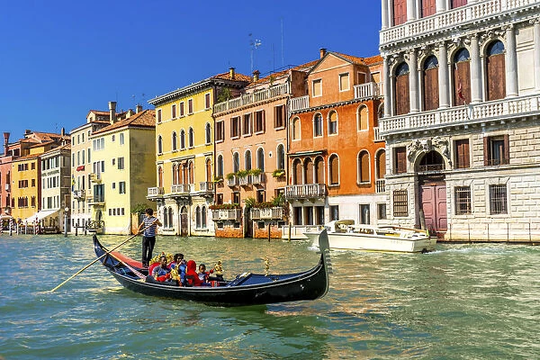 Colorful Grand Canal gondola reflections, Venice, Italy