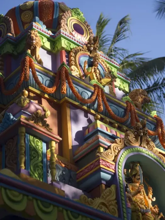 Framed Print : A colorful Hindu temple is decorated with colors and flower wreaths in Bangalore Framed Print : A colorful Hindu temple is decorated with colors and flower wreaths in Bangalore