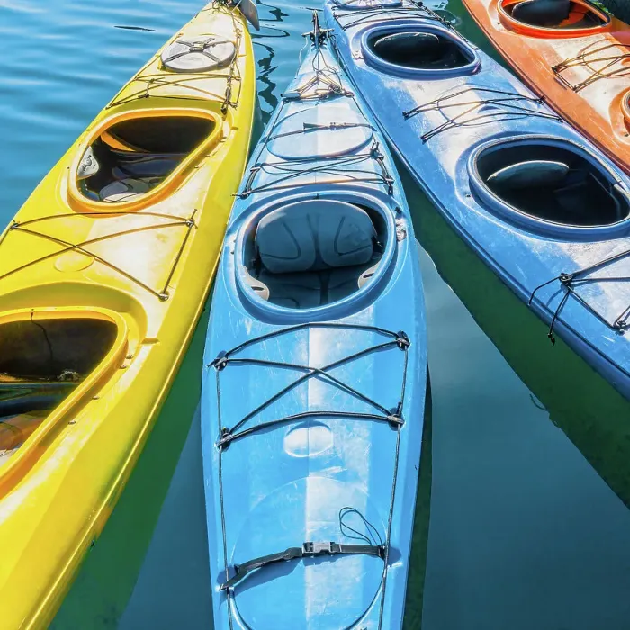 Framed Print : Four colorful kayaks positioned in an array