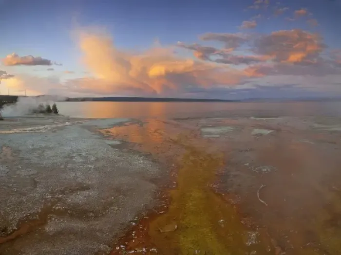 Framed Print : Colorful mineral deposits emit from Black Pool geyser in the West Thumb Geyser Basin