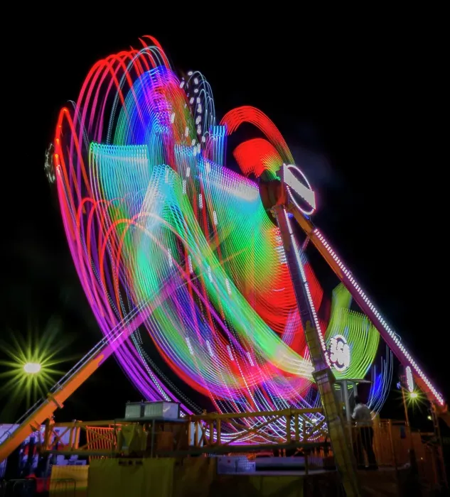 Framed Print : Colorful motion blur of spinning ride at a carnival Framed Print : Colorful motion blur of spinning ride at a carnival