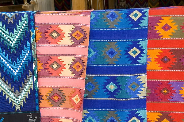 Colorful patterns and fabrics mademade artwork in San Antonio on remote Lake Atitlan