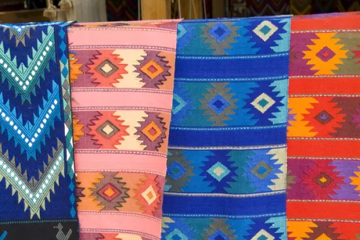 Framed Print : Colorful patterns and fabrics mademade artwork in San Antonio on remote Lake Atitlan Framed Print : Colorful patterns and fabrics mademade artwork in San Antonio on remote Lake Atitlan