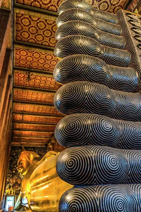 Framed Print : Colorful Reclining Buddha toes, Bangkok, Thailand. Temple built in 1600's. Reclining Buddha built in 1832. Symbolize Buddha's entrance into nirvana Framed Print : Colorful Reclining Buddha toes, Bangkok, Thailand. Temple built in 1600's. Reclining Buddha built in 1832. Symbolize Buddha's entrance into nirvana