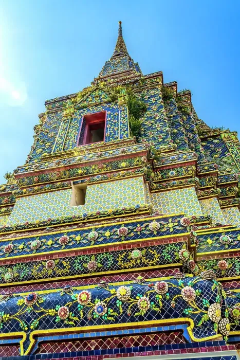 Framed Print : Colorful red door ceramic Pagoda Phra Maha Chedi, Wat Pho Temple, Bangkok, Thailand. Phra Maha Pagodas were built between 1851 to 1868 by King Rama IV Mongkut. Wat Pho is one of the oldest temples in Thailand