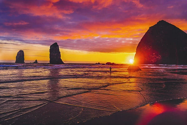 Colorful sunset, Haystack Rock sea stacks, Canon Beach, Clatsop County, Oregon