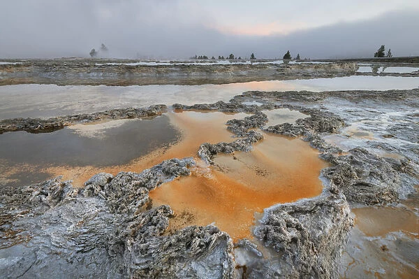 Colorful travertine formations at Great Fountain Geyser, Yellowstone National Park