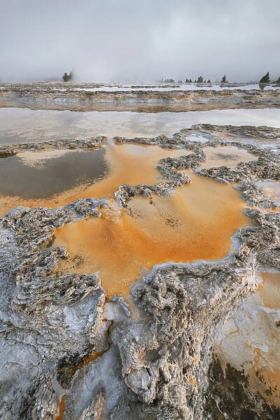 Colorful travertine formations at Great Fountain Geyser, Yellowstone National Park