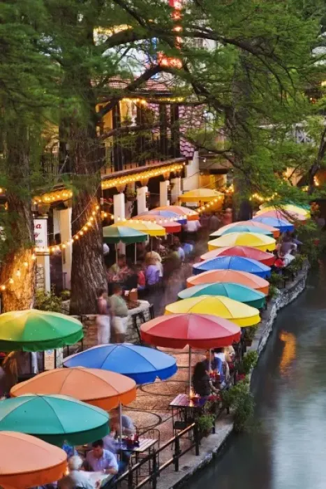 Framed Print : Colorful umbrellas of outdoor cafe along famous River Walk, and San Antonio River Framed Print : Colorful umbrellas of outdoor cafe along famous River Walk, and San Antonio River