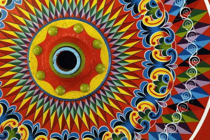 Framed Print : Colorfully painted wagon wheel, Costa Rica Framed Print : Colorfully painted wagon wheel, Costa Rica