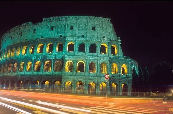 The Colosseum in Rome, Italy with light streaks from passing cars during time exposure
