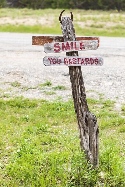 Comfort, Texas, USA. Humorous sign in the Texas Hill Country. (Editorial Use Only)