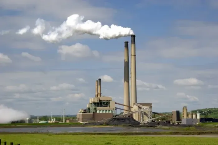 Framed Print : The Conesville coal fired power plant with belching smoke near Coshocton, Ohio