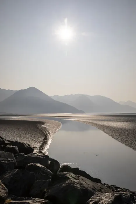 Framed Print : Cook Inlet, Alaska, curved stream, mountains, black and white, sunburst