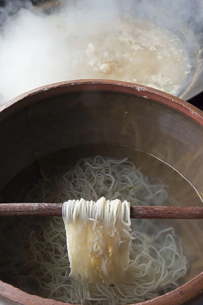 Cooking noodles, Pengzhen, Chengdu, Sichuan Province, China