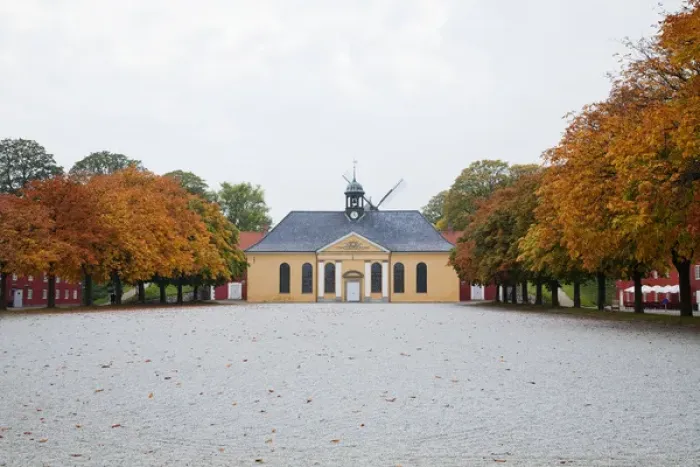 Framed Print : Copenhagen, Denmark - A large parade ground is lined with trees. In the background Framed Print : Copenhagen, Denmark - A large parade ground is lined with trees. In the background