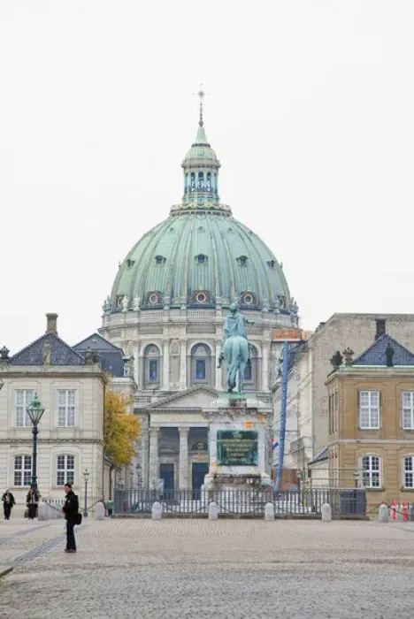 Framed Print : Copenhagen, Denmark - An ornate, domed building with a statue in the foreground